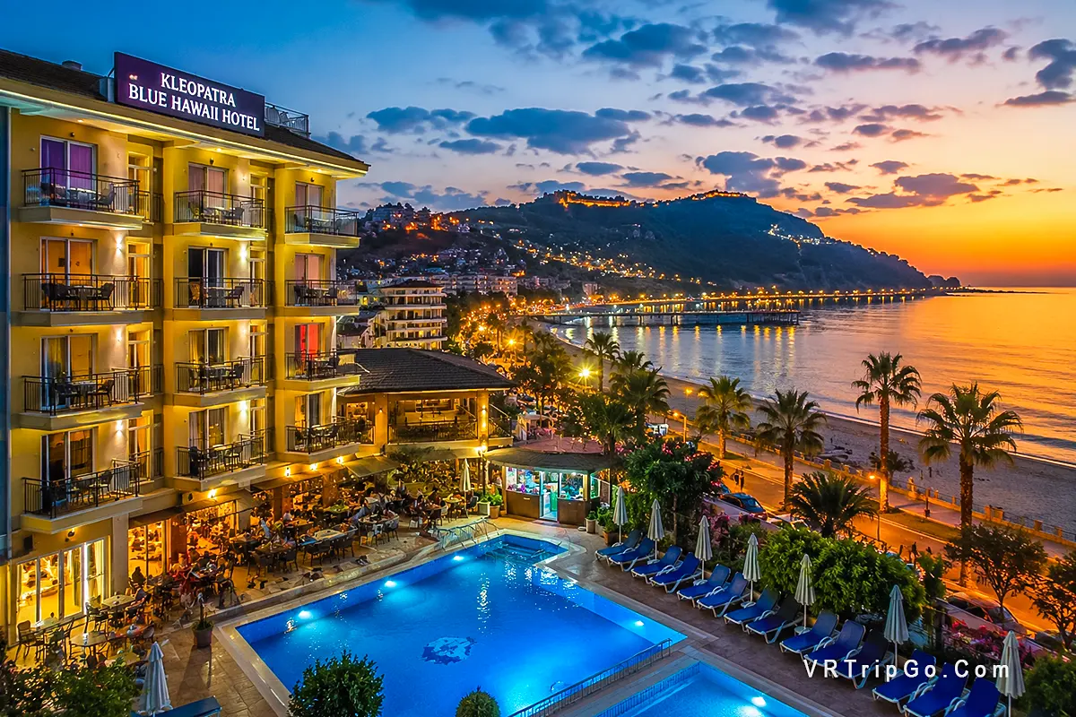 Cheap hotels in Alanya near beach with pool and city view at sunset, affordable accommodation options in Alanya Turkey