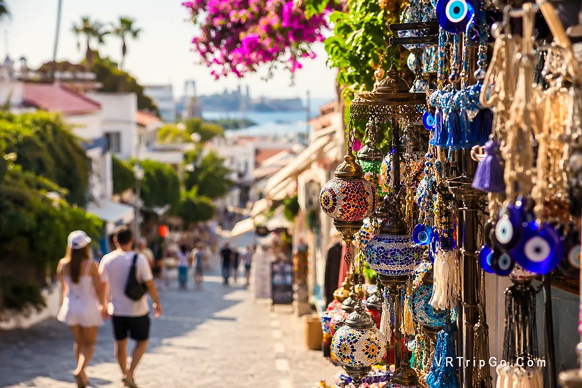 Kusadasi Travel Guide market street with traditional Turkish lanterns and local souvenir shops near the Aegean coast in Turkey