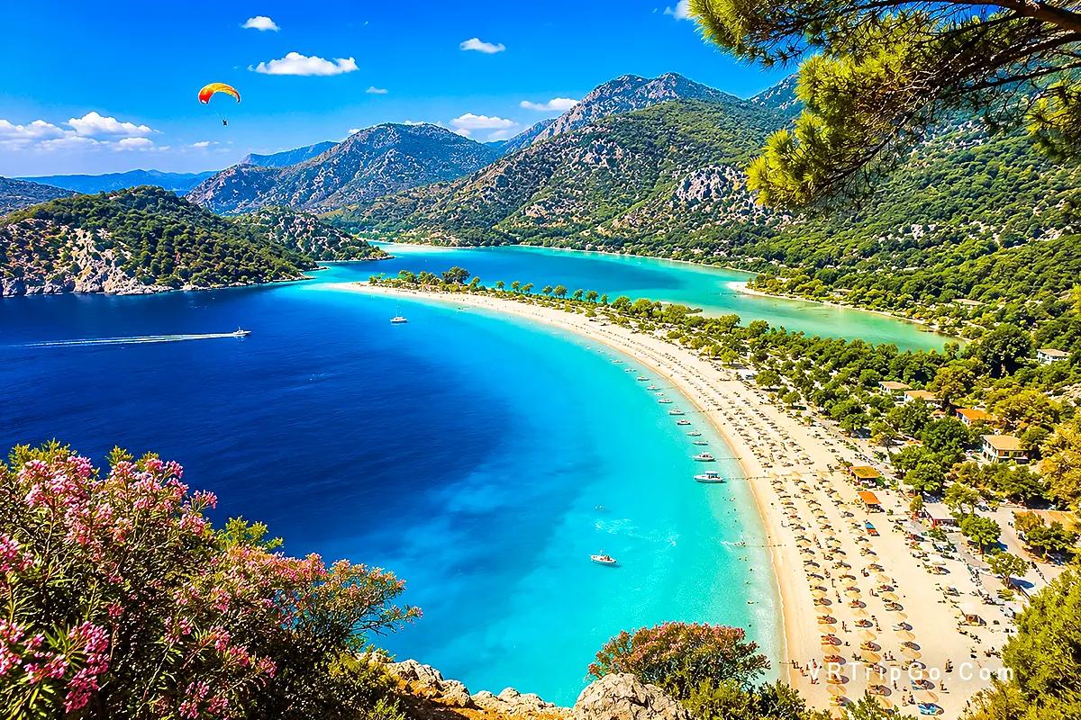 Oludeniz Travel Guide with turquoise Blue Lagoon, sunny beach weather, paragliding views, and vibrant summer atmosphere on the Mediterranean coast in Turkey