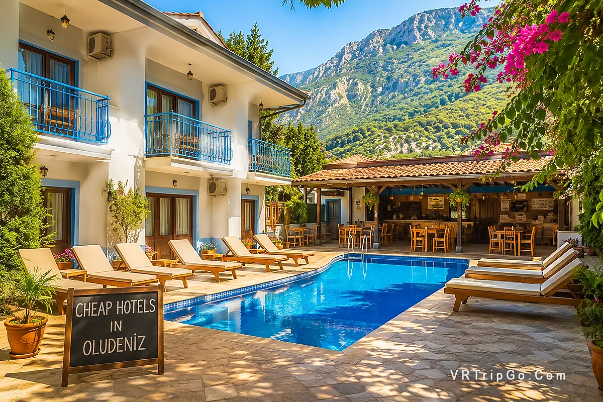 Cheap hotels in Oludeniz with outdoor swimming pool, mountain views and affordable Mediterranean accommodation near the beach.