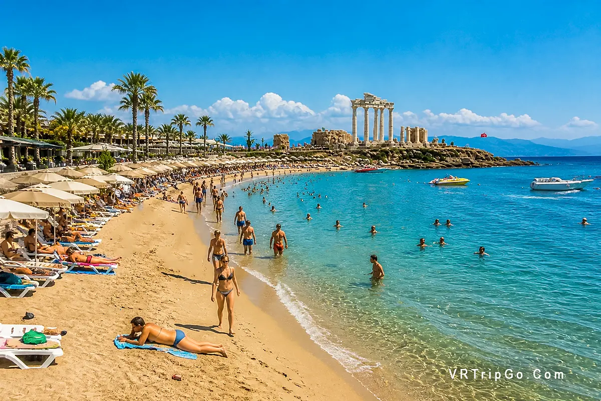 side weather in summer beach people swimming sunbathing hot sunny day turquoise sea Antalya Turkey