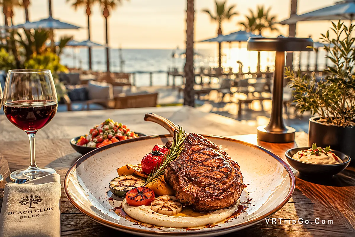 Traditional Turkish food in Belek served at a luxury beach club restaurant with grilled steak, Mediterranean appetizers, and sunset sea view