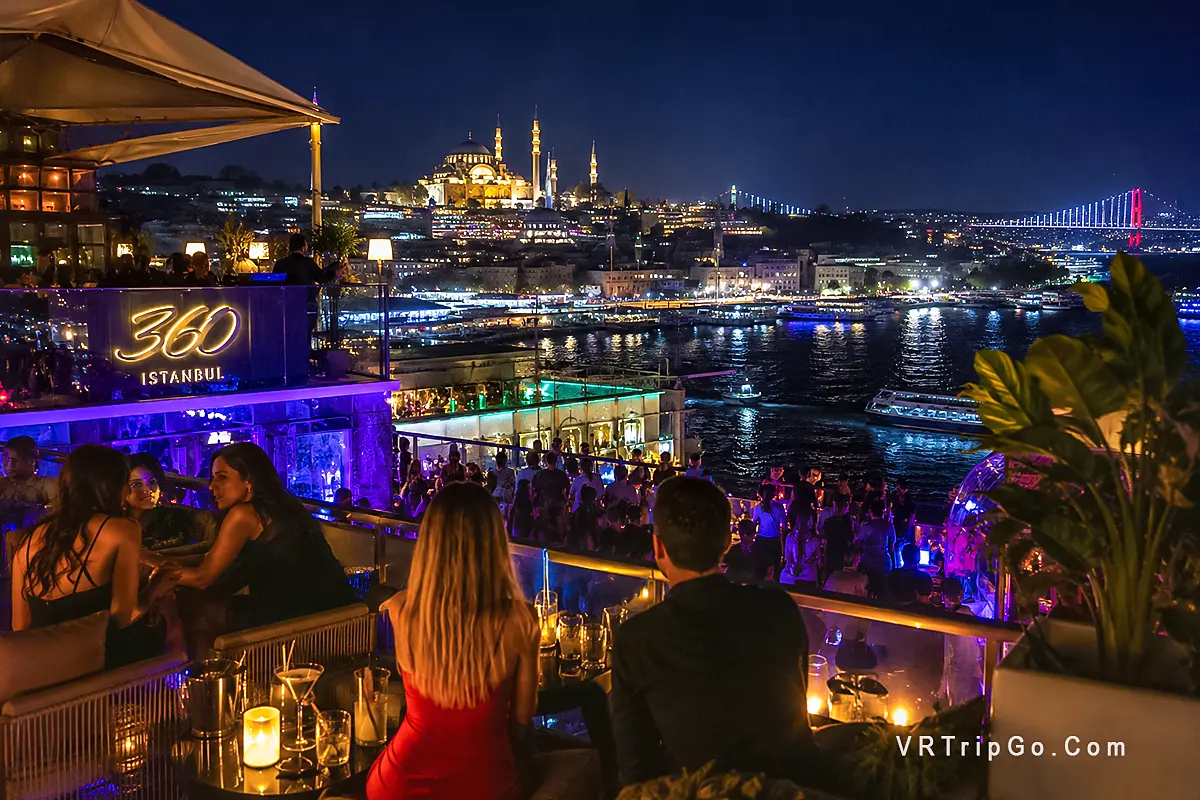 Nightlife in Istanbul rooftop bar with Bosphorus view luxury nightlife cocktails glowing city lights and vibrant evening atmosphere