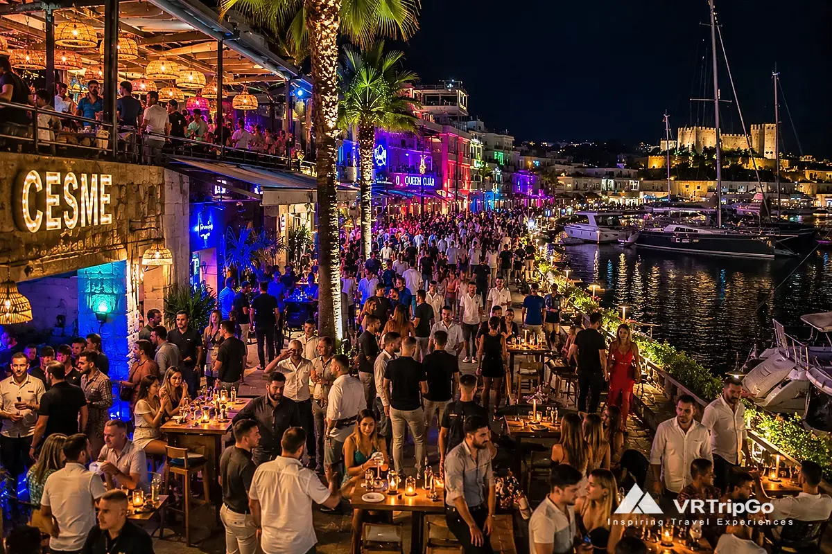 Nightlife in Cesme crowded waterfront clubs and colorful beach nightlife scene