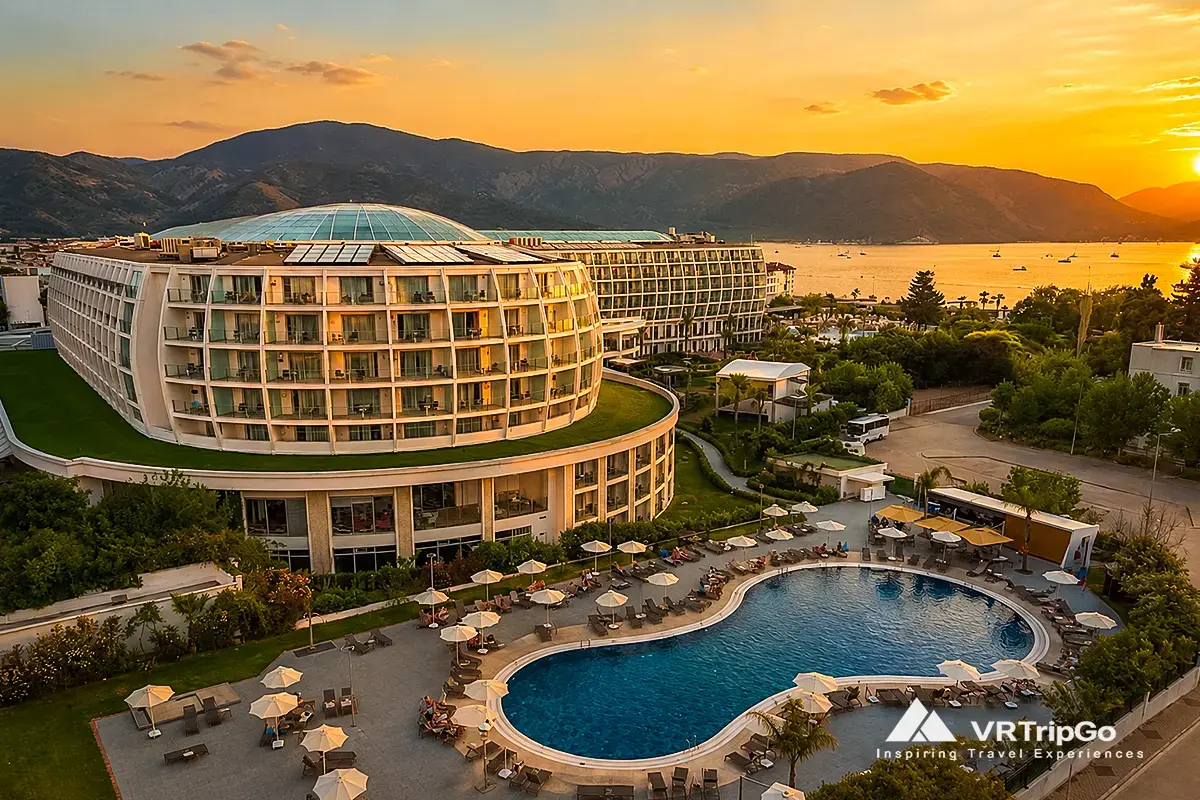 Best Hotels in Marmaris luxury beachfront resort at sunset with pool and sea view