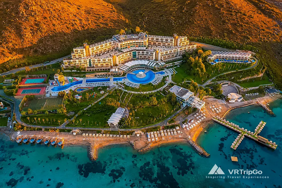 luxury hotels in Bodrum aerial sunset resort and turquoise coastline view