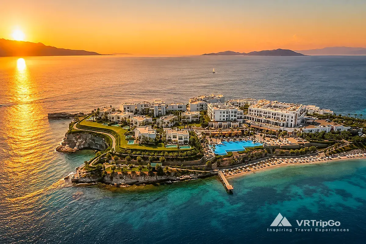 Best Hotels in Bodrum luxury seaside resort aerial view at sunset with turquoise sea and private beach in Turkey