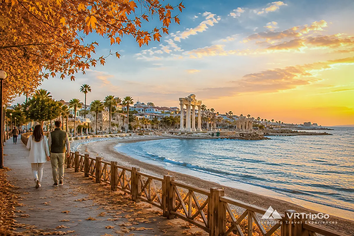 Side Weather in Autumn: Couple Walking Along the Seafront Promenade Near the Temple of Apollo During a Warm Autumn Evening in Side, Turkey