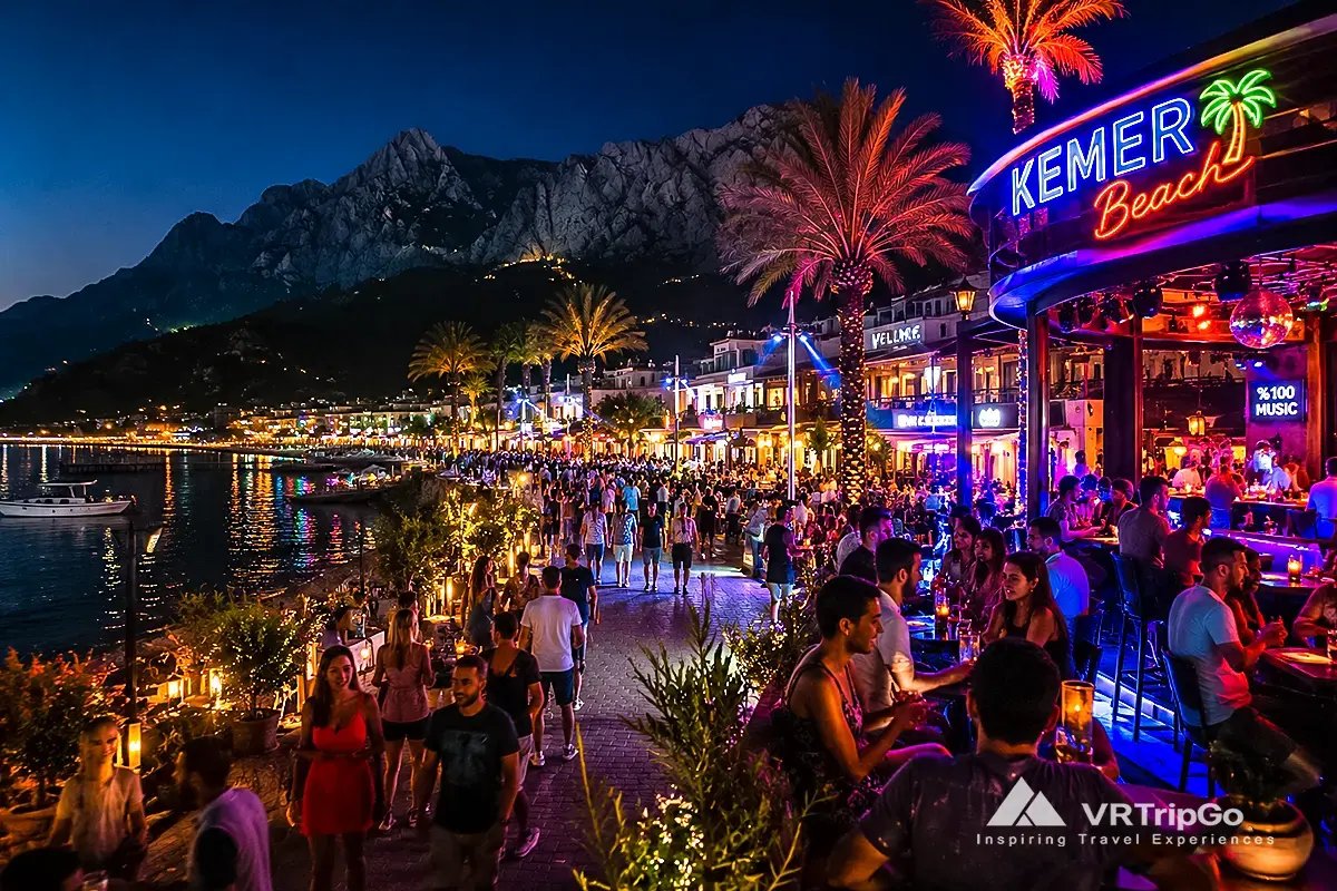 Nightlife in Kemer vibrant beach clubs and seaside bars at night with mountain view