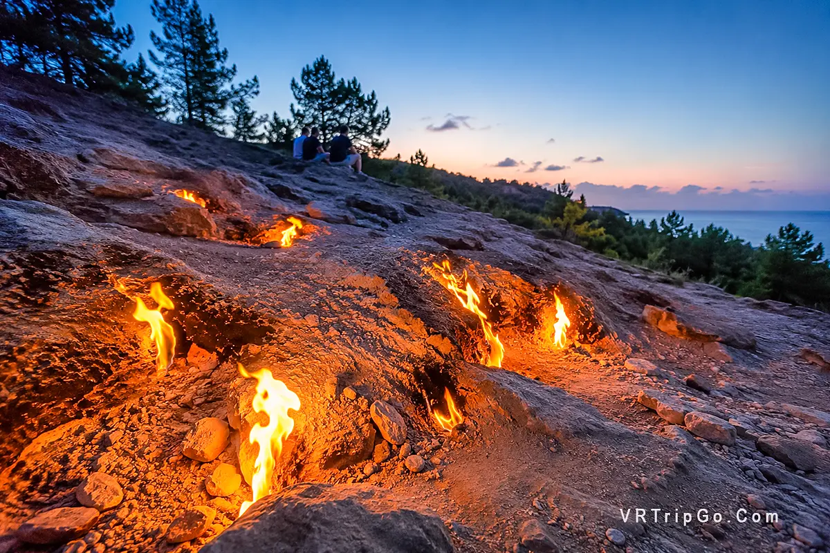 Chimaera Night Tour featuring the eternal flames of Yanartas, natural fires emerging from rocky mountainsides, and a unique twilight experience near Olympos and Kemer.