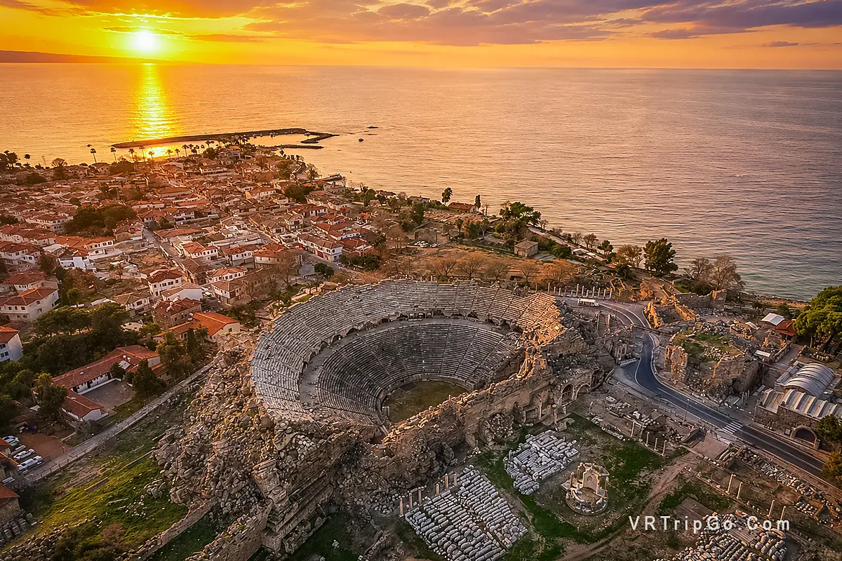 Side City Tour featuring the ancient Roman theatre, historic ruins, and stunning Mediterranean coastline at sunset.