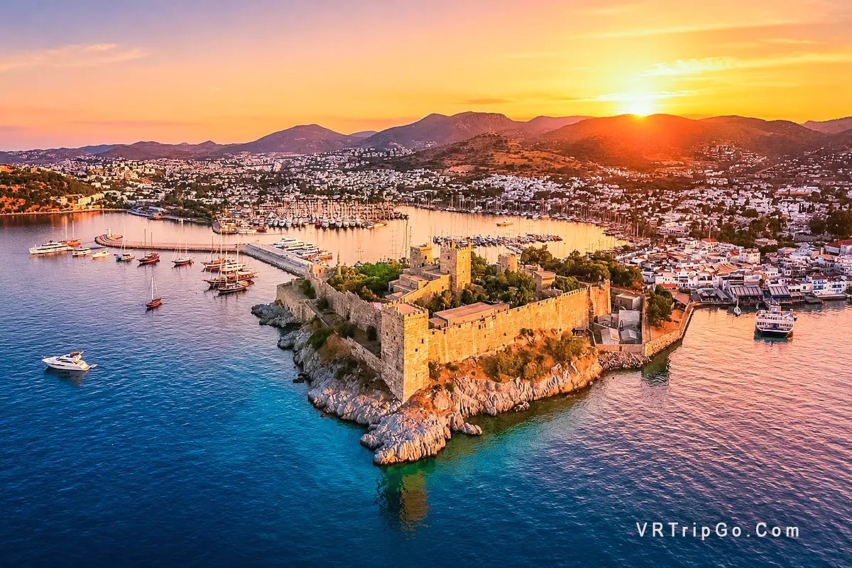 Best Excursions in Bodrum featuring Bodrum Castle, a scenic marina, turquoise Aegean waters, and stunning sunset views over the historic coastline.
