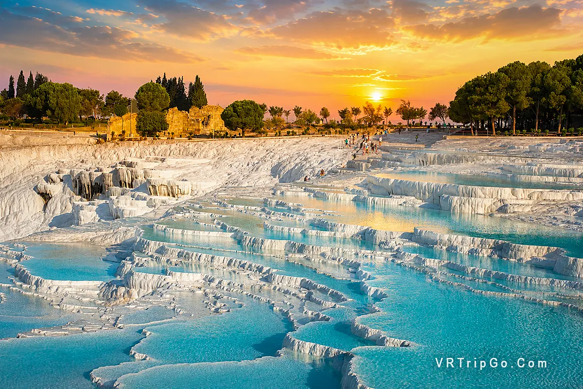 Pamukkale Day Trip from Bodrum featuring turquoise travertine terraces, crystal-clear thermal pools, and stunning sunset views in Pamukkale.