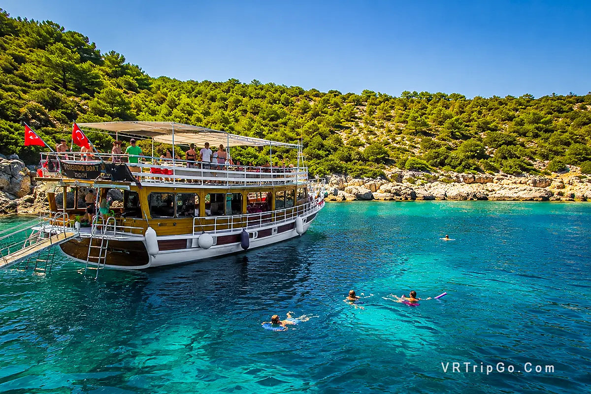 Didim Boat Tour with Crystal Clear Bays, Swimming Stops and Scenic Aegean Coastline