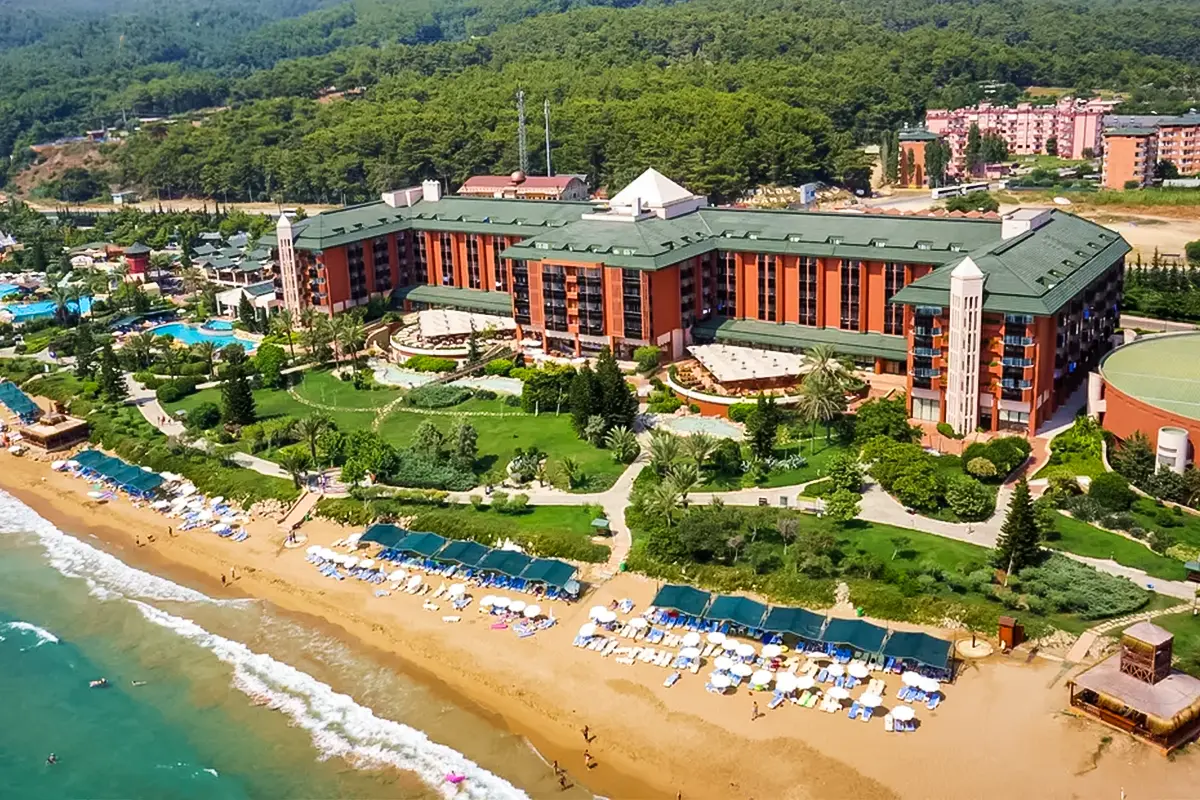 AQI Pegasos Royal, one of the Best Family Hotels in Alanya, with beachfront gardens and pine-covered hills in Incekum.