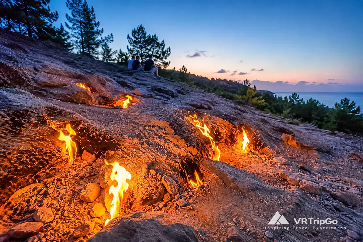 Chimaera Night Tour featuring the eternal flames of Yanartas, natural fires emerging from rocky mountainsides, and a unique twilight experience near Olympos and Kemer.