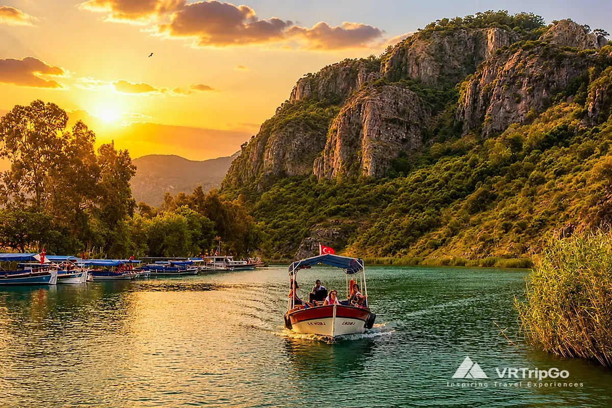 Dalyan Tour and Turtle Beach featuring a scenic river cruise through lush landscapes, dramatic cliffs, and beautiful sunset views